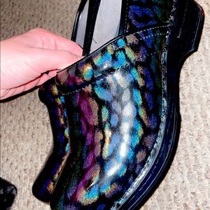 Dansko Brand Woman’s Nursing Clogs. Translucent leopard color/design.